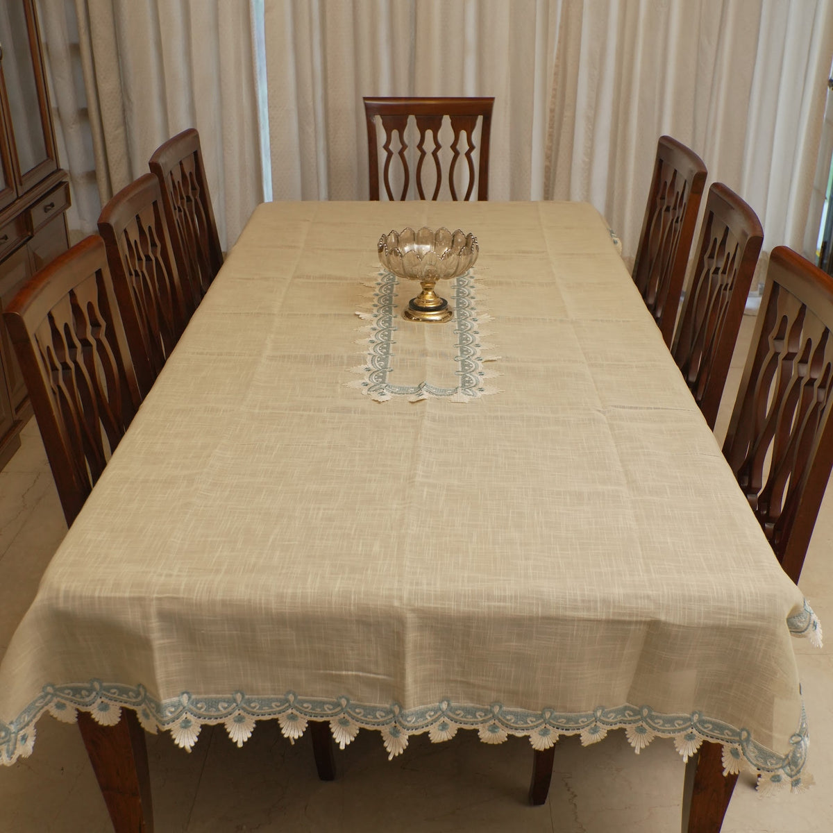 Aqua lace table sheet styled with a centrepiece