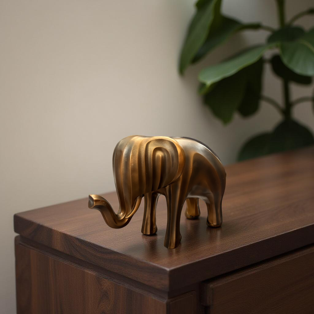 Modern Soft Golden Elephant Showpiece – Abstract Figurine