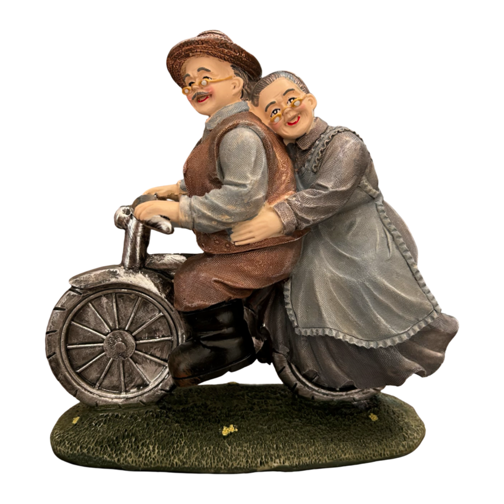 Romantic Elderly Couple on Bicycle Figurine
