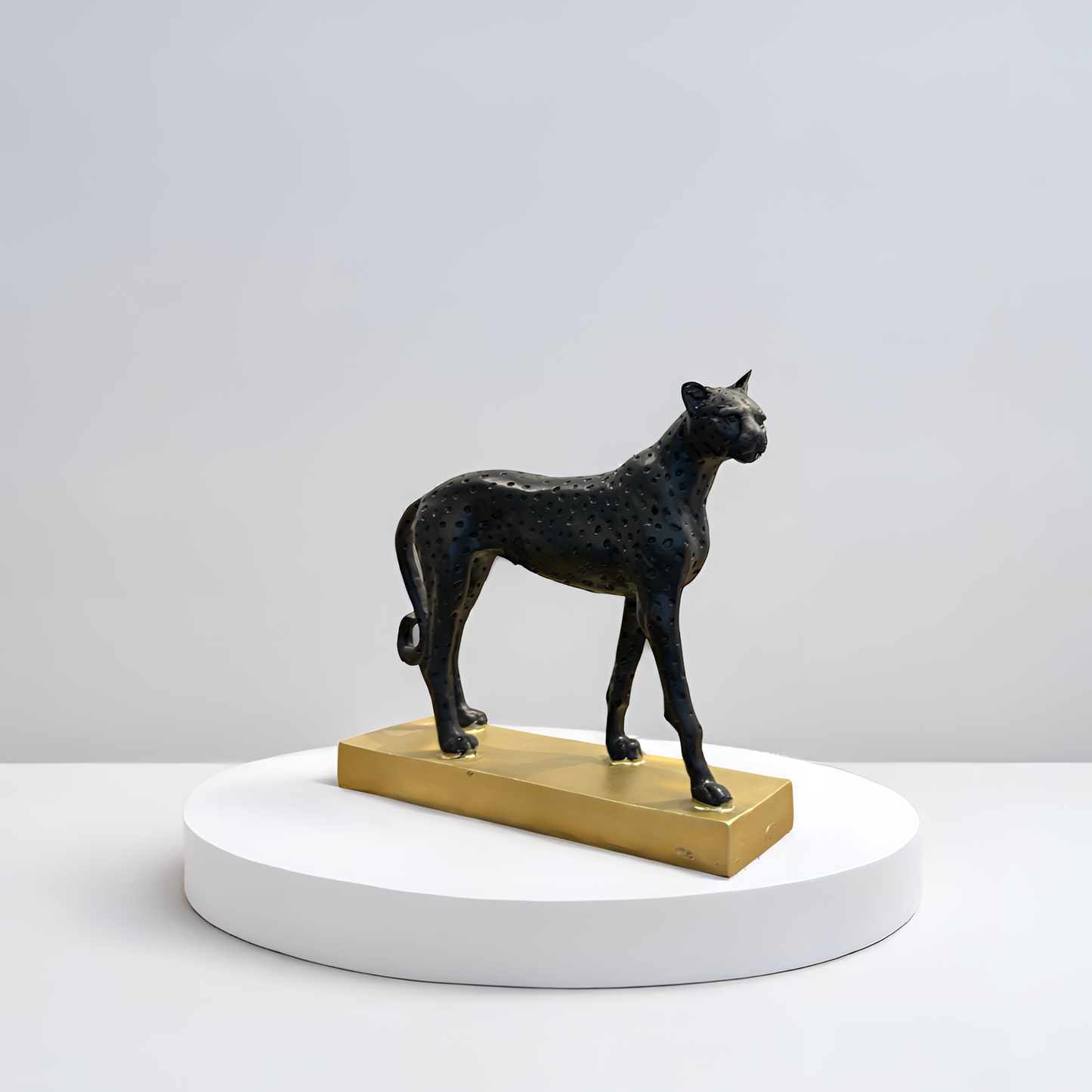 Black Cheetah Sculpture on Golden Base