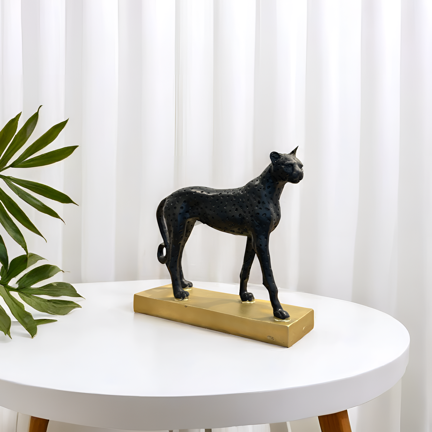 Black Cheetah Sculpture on Golden Base