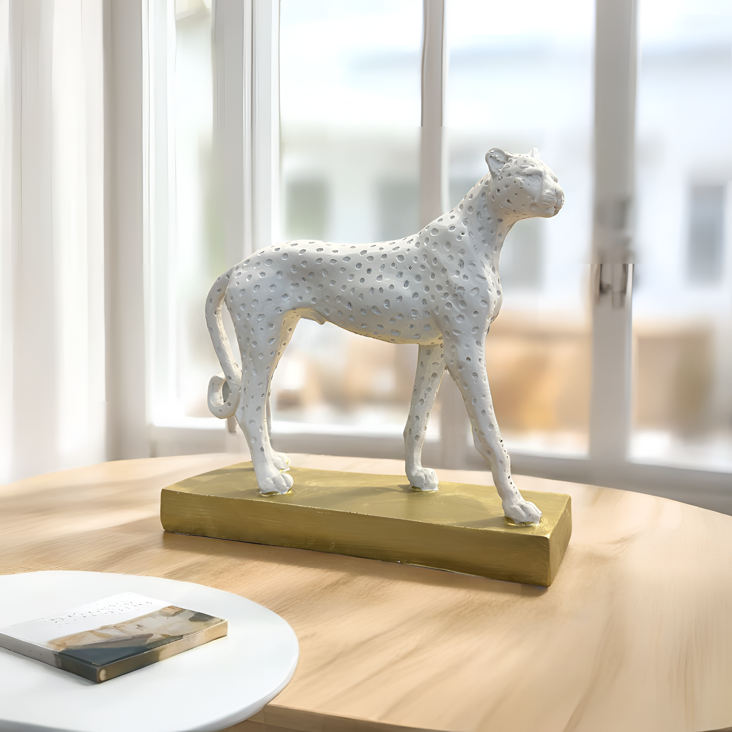 White Cheetah Sculpture on Golden Base