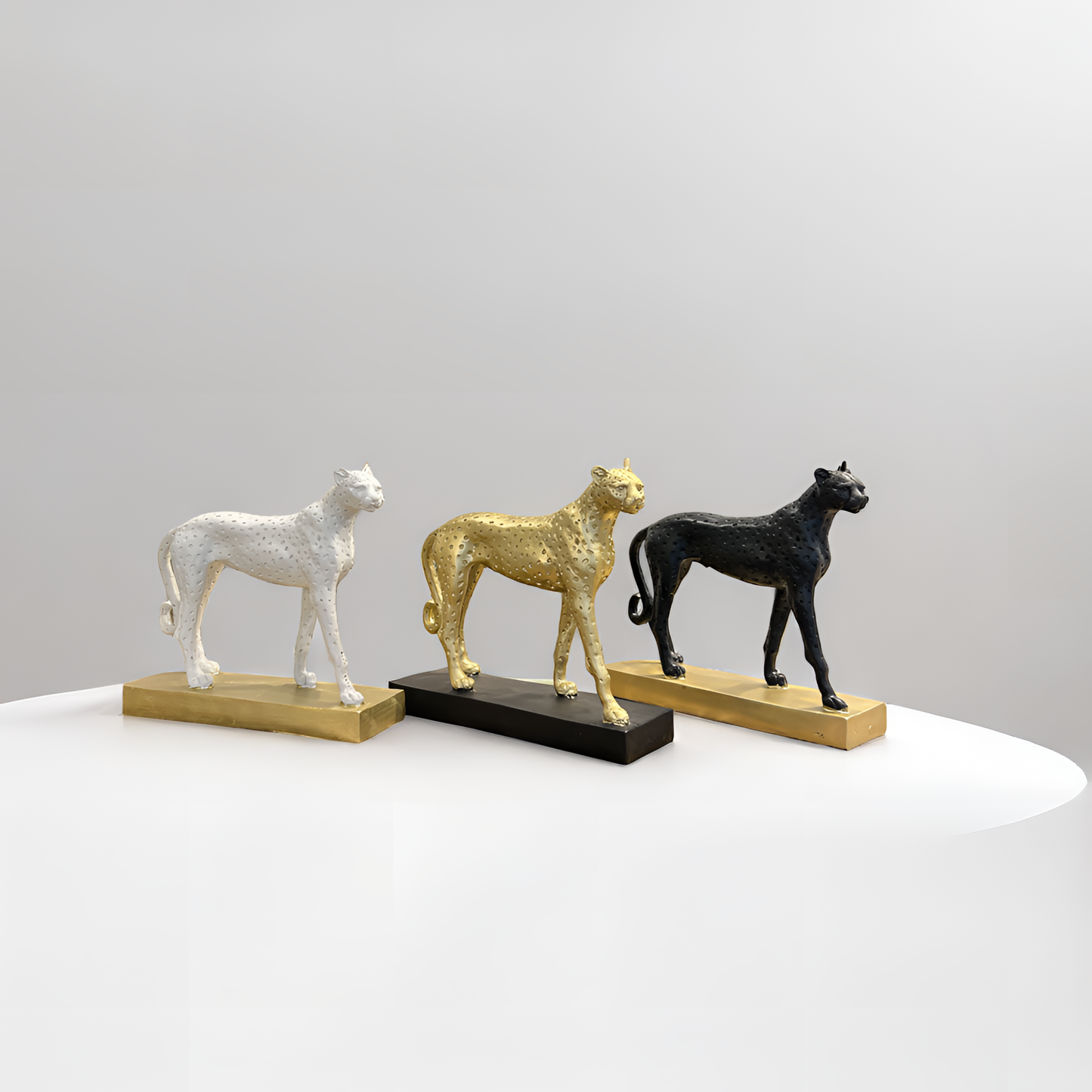 White Cheetah Sculpture on Golden Base