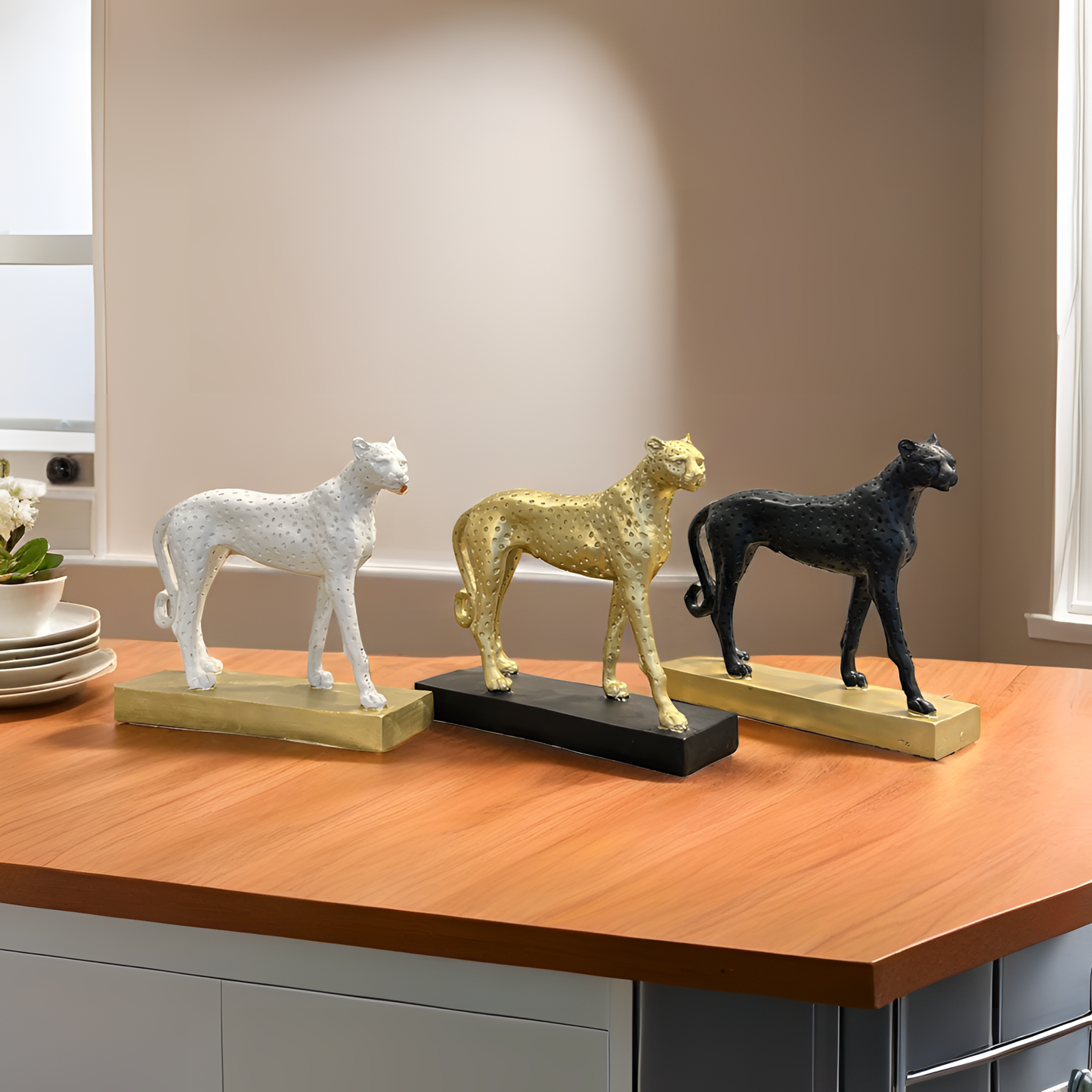 Golden Cheetah Sculpture on Black Base