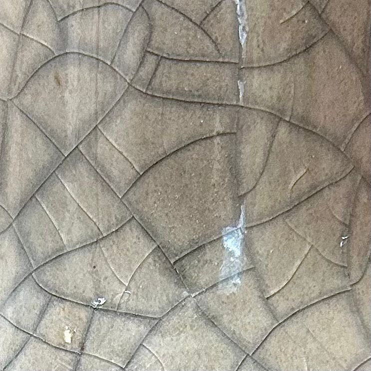 Elegant Ceramic Small Vase with Red Feather Motif