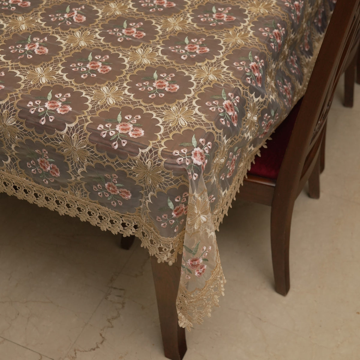 Pink floral sheer lace table sheet on a 6 seater dining table