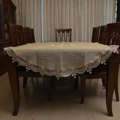 Pink rose lace round table sheet on a dining table