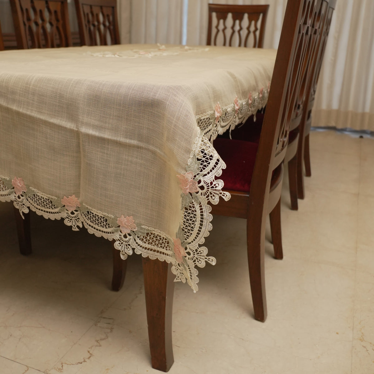 Corner drape showing the pink rose lace border