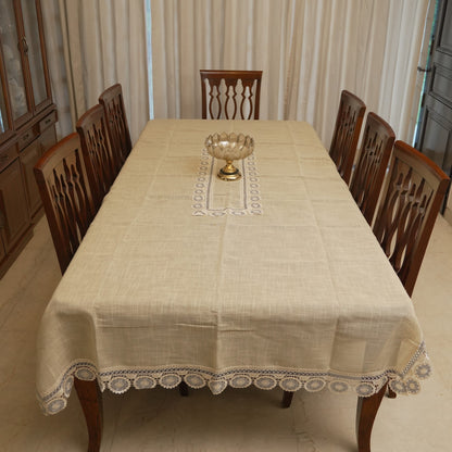Grey medallion lace table sheet on a 10 seater dining table