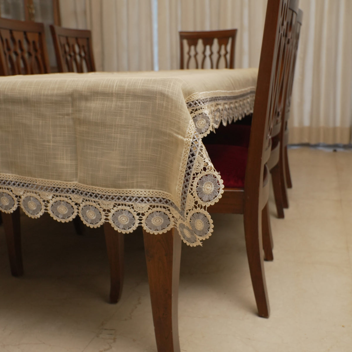 Corner drape showing the grey medallion lace border