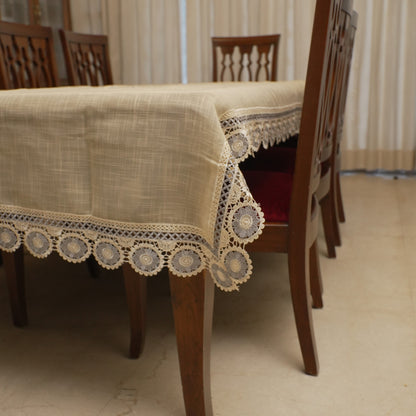 Corner drape showing the grey medallion lace border