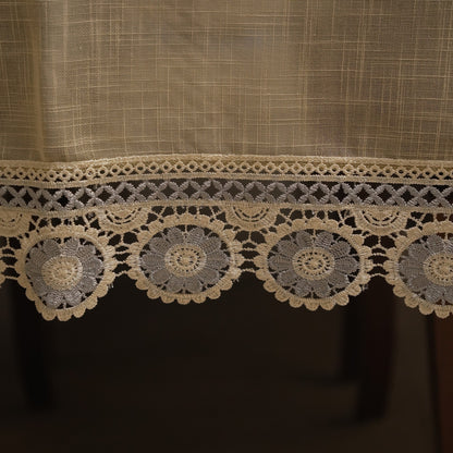 Close-up of the grey crochet medallions