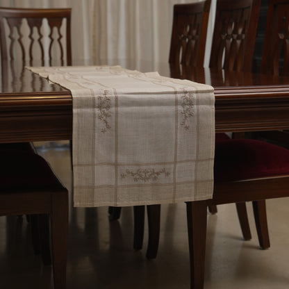 Table runner draped over the end of the dining table