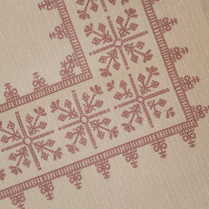 Close-up of the rose pink cross-stitch pattern