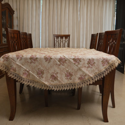 Vintage rose print round table sheet with lace border on a round dining table