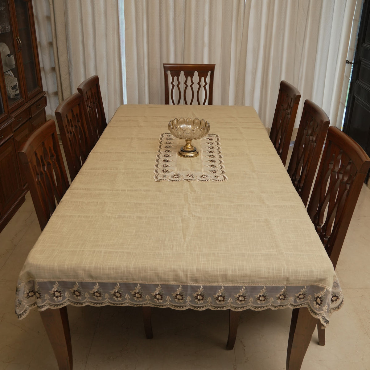 Floral lace border table sheet styled with a centrepiece