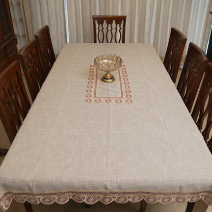 Mauve medallion lace table sheet styled with a centrepiece