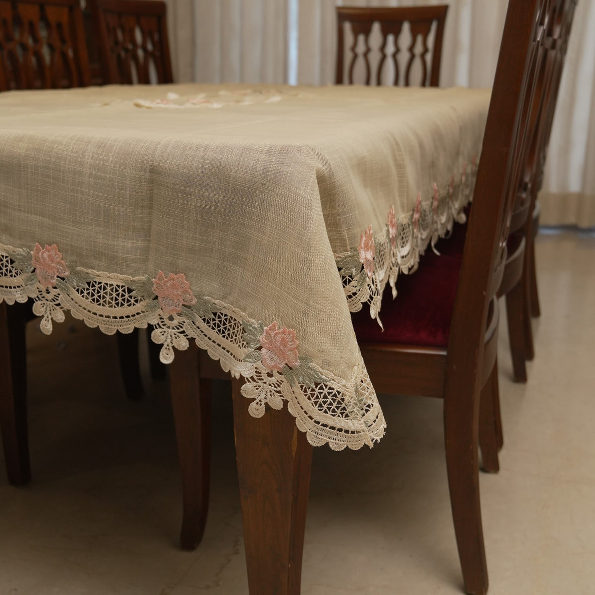 Pink rose lace border table sheet on a 6 seater dining table
