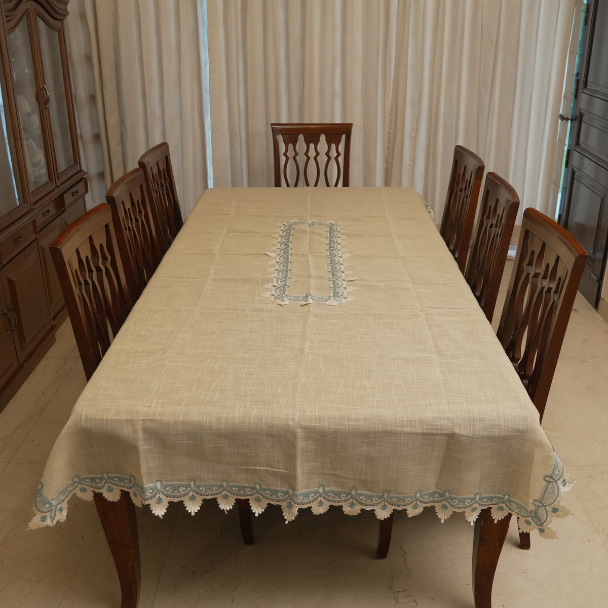 Aqua lace border table sheet on a 10 seater dining table