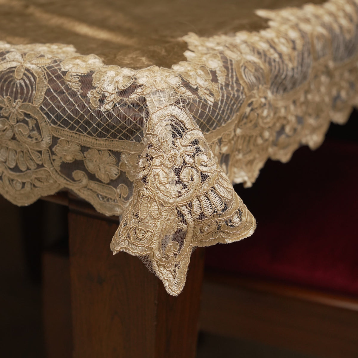 Corner drape showing the cream lace border