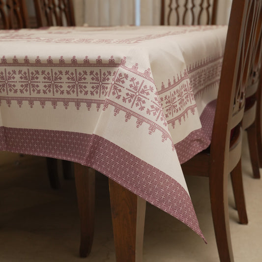 Rose pink cross-stitch border table sheet on a 6 seater dining table