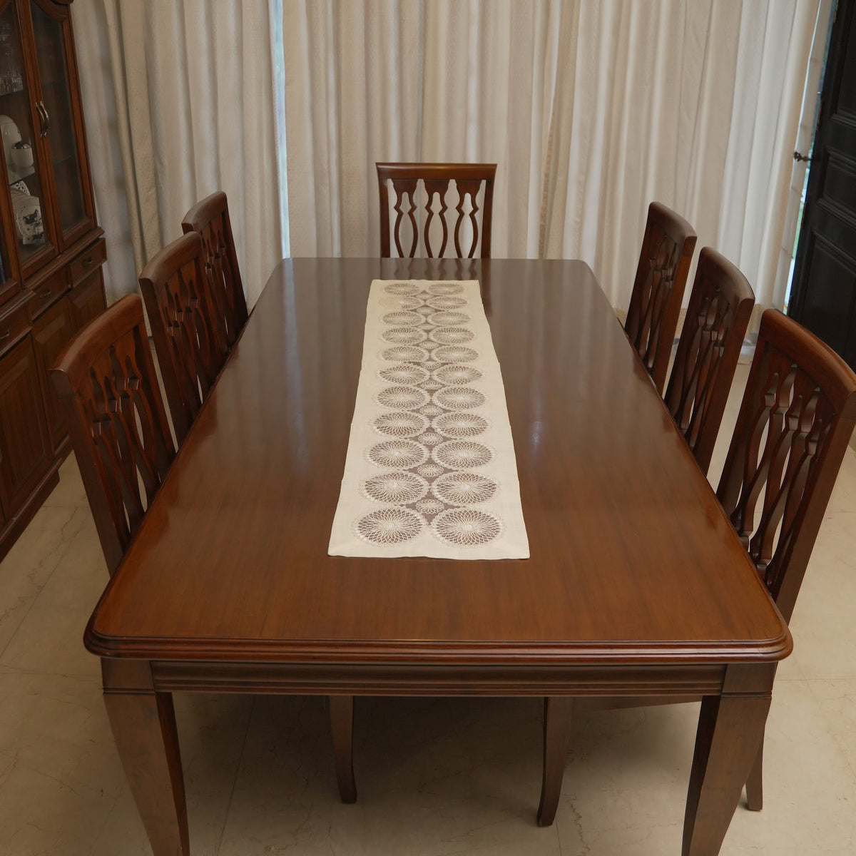 Circle lace medallion runner on a dining table