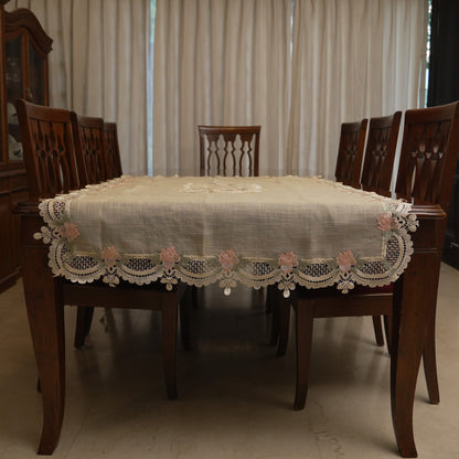 Pink rose lace table sheet on a dining table