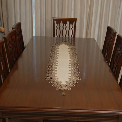 Taupe lace border linen runner on a dining table