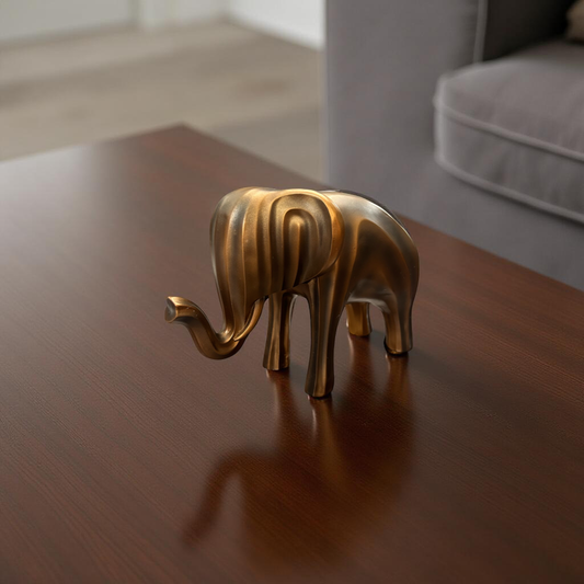 Modern Soft Golden Elephant Showpiece – Abstract Figurine