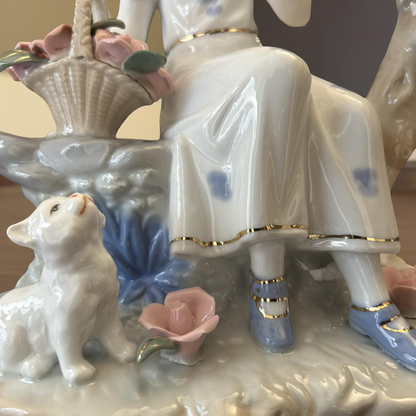 Fine Porcelain Girl with Flowers Figurine – Elegant Decorative Showpiece