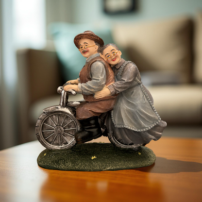Romantic Elderly Couple on Bicycle Figurine
