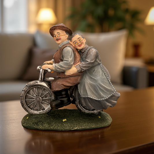Romantic Elderly Couple on Bicycle Figurine