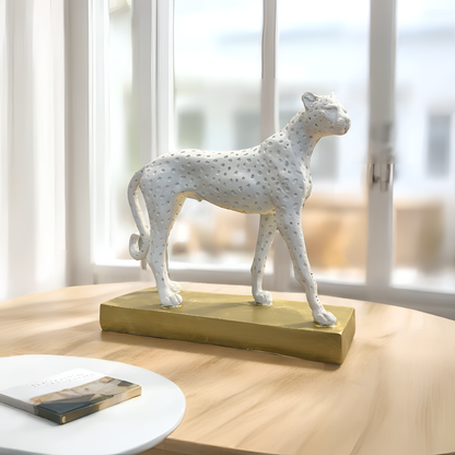 White Cheetah Sculpture on Golden Base