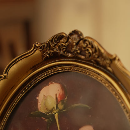 Elegant Oval Gold Decorative Frame with Classic Rose Design