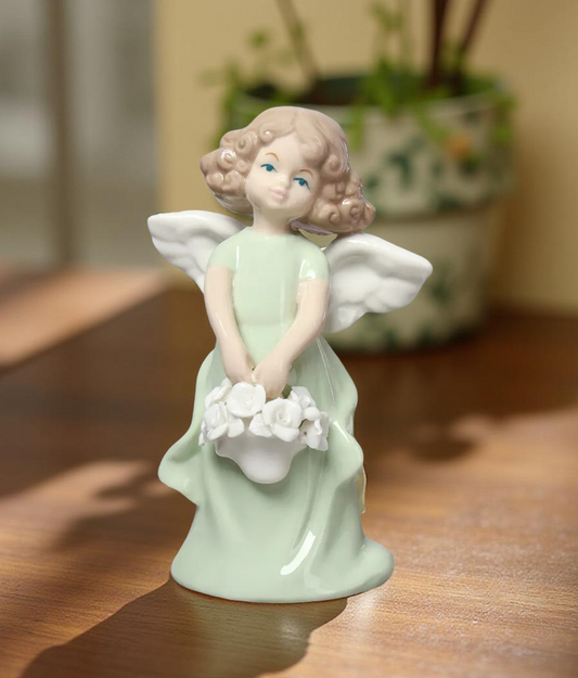 Porcelain Angel Figurine in Light Green– Holding Flower Basket