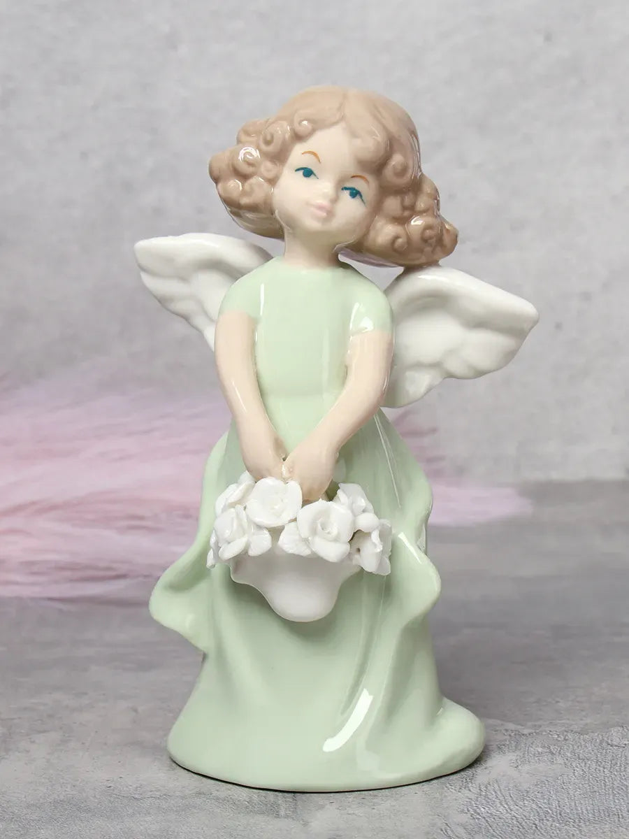 Porcelain Angel Figurine in Light Green– Holding Flower Basket
