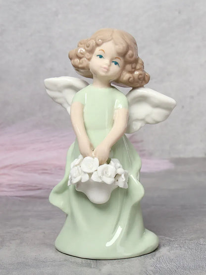 Porcelain Angel Figurine in Light Green– Holding Flower Basket